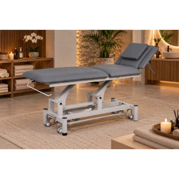 Elektrische Kosmetikliege mit grauer Polsterung und 1-Motor-Hydraulik für professionelle Massage- und Behandlungsräume.