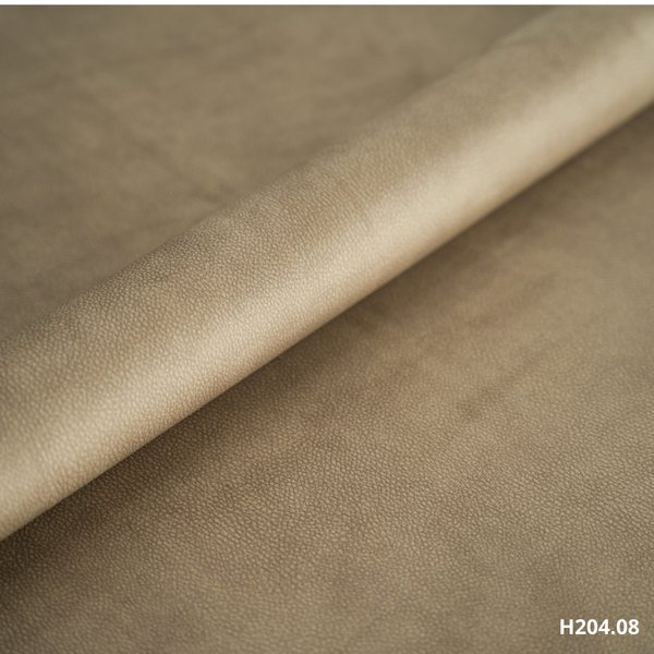 Beige Lederlook-Polsterstoff, Nahaufnahme der individuellen Polsterung einer Premium-Massageliege.