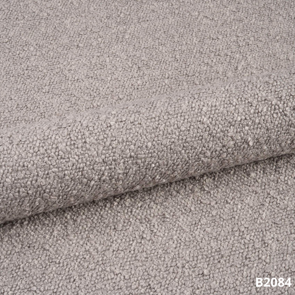 Beiger Stoffbezug der Premium-Massageliege ELEMENT mit individueller Polsterung, Spa-Qualität.