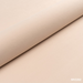 Beigefarbener Stoffbezug einer Premium-Elektrischen Massageliege ELEMENT, Nahaufnahme des Polsterbezugs.