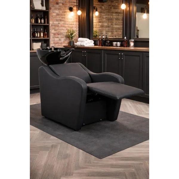Friseur-Waschbecken Kalani-Air mit elektrisch verstellbarer Fußstütze und Massagefunktion im modernen Salon.