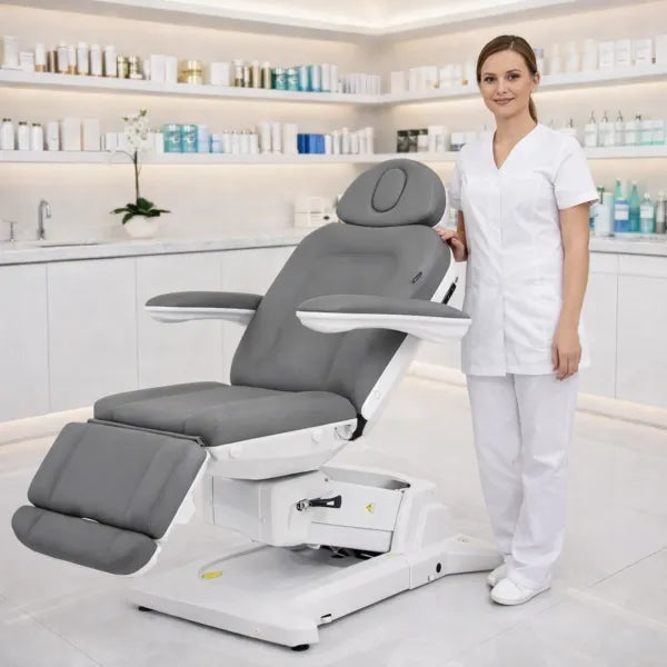 Elektrische Kosmetikliege SIMUS grau, drehbar, 4 Motoren, Profi-Studio mit Kosmetikerin.