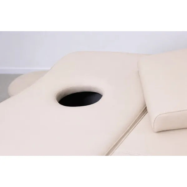 Beige Kopfspa-Liege mit Loch für Kopfunterstützung im Salon
