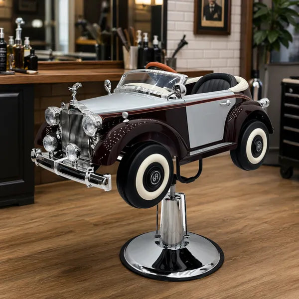 Kids' Shelby car barber chair with lights, sound, and hydraulic height adjustment on a chrome pedestal