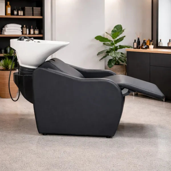 Velaris Air Friseur-Waschbecken in Schwarz mit elektrischer Fußstütze und Massagefunktion.
