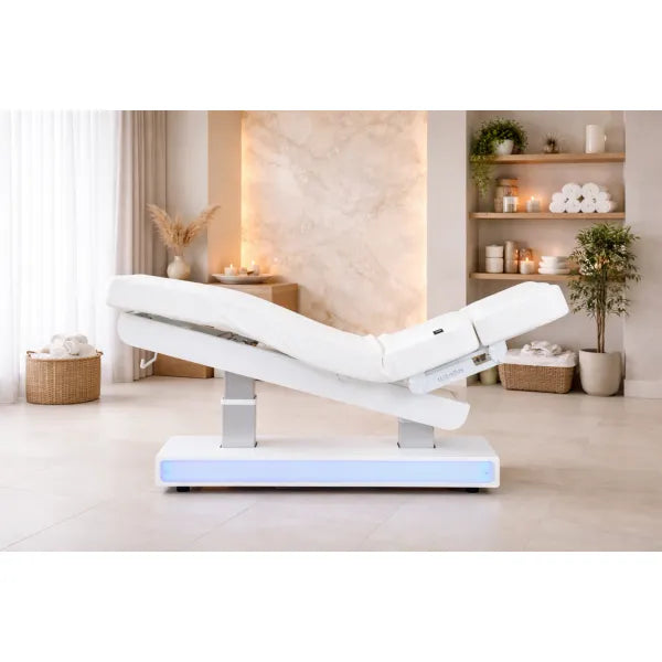Elektrische Kosmetikliege MUSE+ Spa-Liege mit Heizung, LED & 4 Motoren in modernem Spa-Raum.