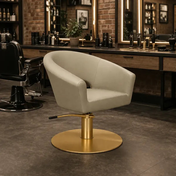 Friseurstuhl Cosmo – luxuriöser eleganter Salonstuhl mit goldener Rundbasis und cremefarbener Polsterung für Profis