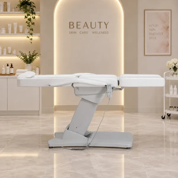 Elektrische weiße Kosmetikliege mit drei Motoren und Handsteuerung für Beauty-Studios und Massage.