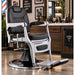 Vintage Barberstuhl Schwarz-Silber, hydraulisch verstellbar mit Fußstütze und klassischem Design für den Herren-Friseurstuhl.