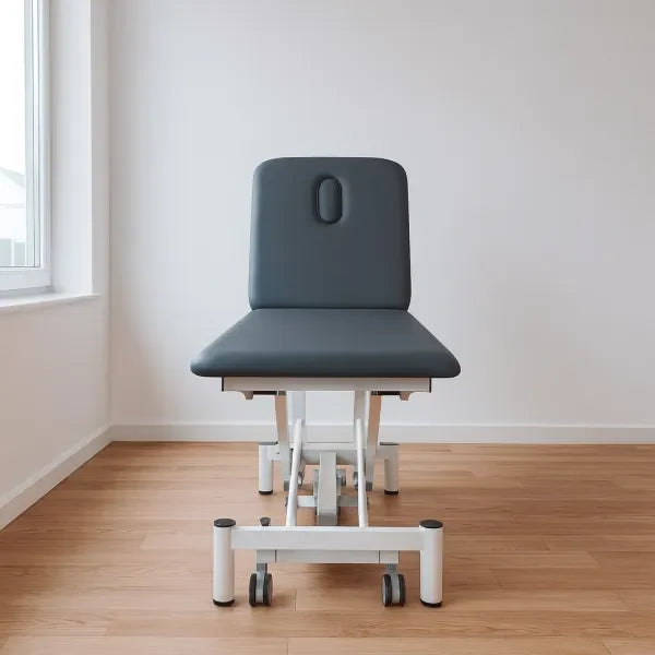 Electric therapy couch PRO 201 in gray for clinic with adjustable height 43.5-90.5 cm and backrest to 80°.