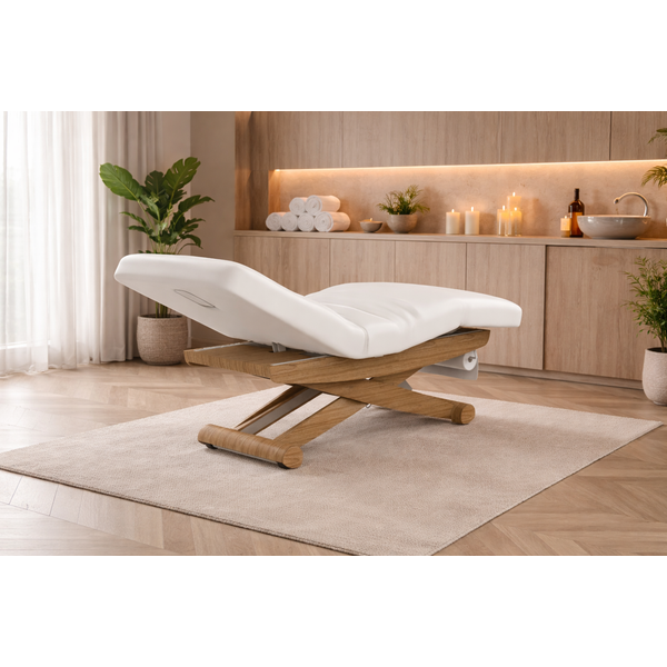 Massageliege aus Holzgestell mit weißen PU-Polstern, X-Beinen und pinken Stützstreben