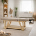 Massageliege Serr aus Holz, 2-Zonen Spa-Liege mit Kopfteil und Armlehnen, helles Design.