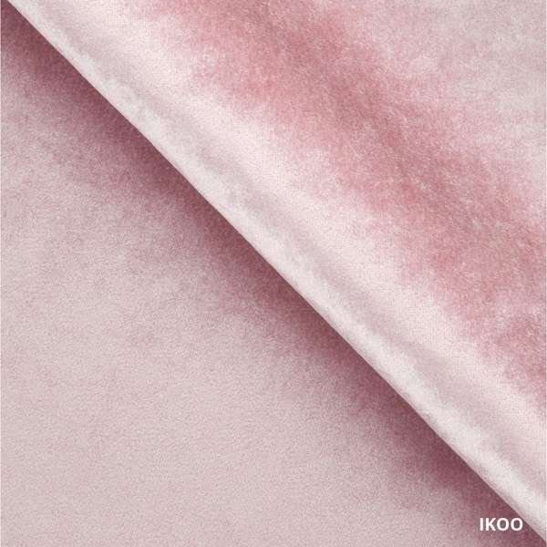 Nahaufnahme pinker Velours-Bezug einer elektrischen Kosmetikliege mit 2 Motoren – IKOO