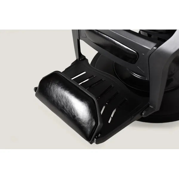 Luxuriöser Barber stuhl Kale-B in Schwarz, ideal für stilvolle Salons und Herrenfriseure. Eleganz und Funktionalität vereint.