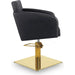 Luxuriöser Friseurstuhl Loris in eleganter Schwarz-Farbe mit goldener Basis für stilvolle Saloneinrichtungen.