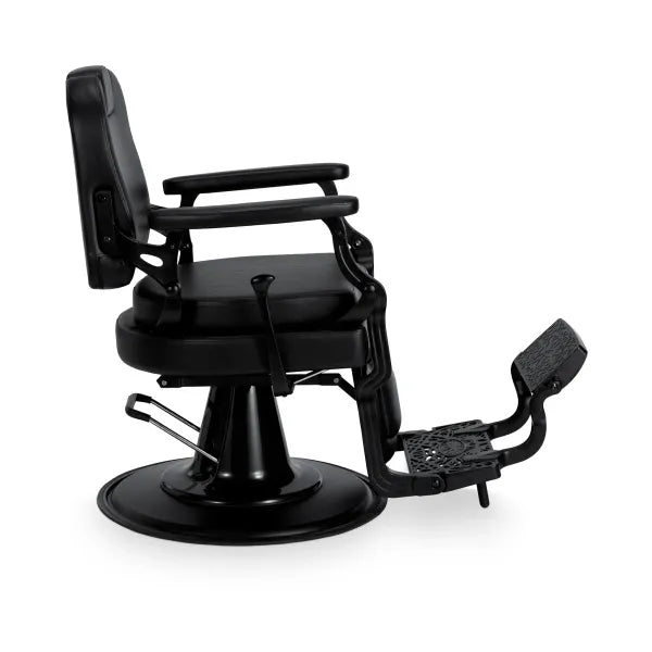 Schwarzer Barbersessel Mark-B: luxuriöser Herren-Friseurstuhl mit gepolsterter Rückenlehne, Armlehnen und Fußpedal.