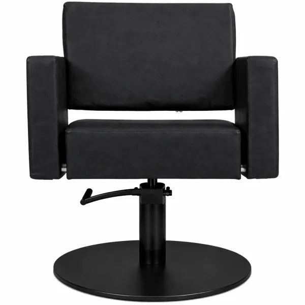 Friseurstuhl Flirty – eleganter Profi-Friseurstuhl mit Hydraulikpumpe, schwarzes Polster, runder Standfuß.
