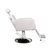 Luxuriöser Friseurstuhl Noor mit verstellbarer Rückenlehne, weißes PU-Leder, Hochdicht-Schaumkern, Fußstütze, Metallbasis.