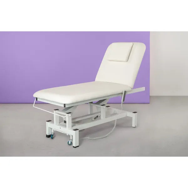 Electric massage table with one motor, height-adjustable treatment bed on wheels, white upholstery.