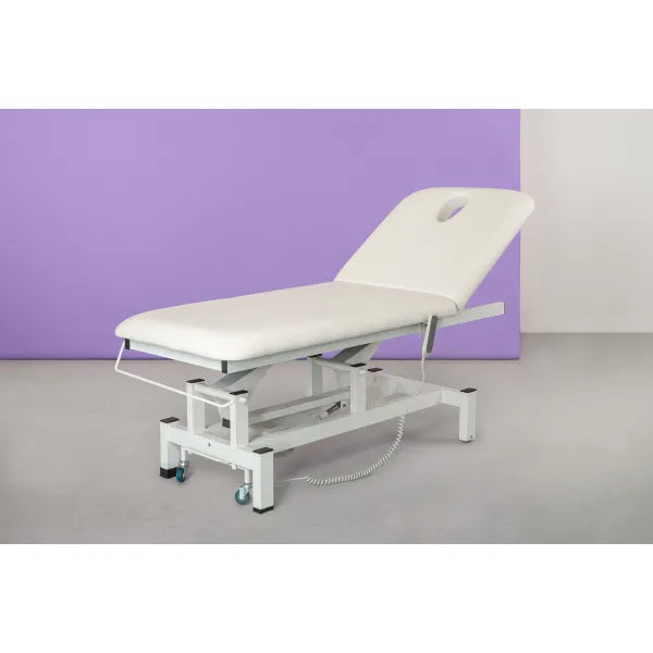 Electric massage table with one motor, height-adjustable treatment bed on a white metal frame with wheels.