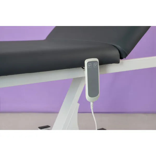 Electrical massage table with one motor and height-adjustable design; handheld remote attached to frame.