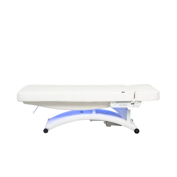Beheizbare Massageliege: Bedienfeld mit LED-Display (60°C) und beleuchteten Knöpfen am braunen Bezug.