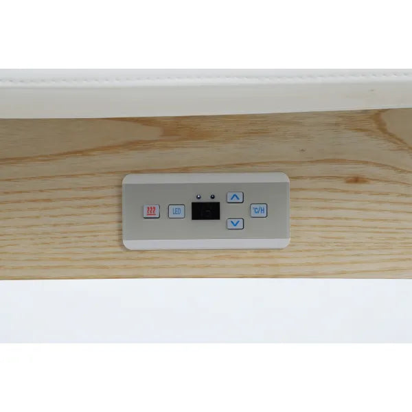 Elektronik-Panel mit Heizung und LED-Bedientaste an der SPA-Kosmetikliege mit Holzoptik.