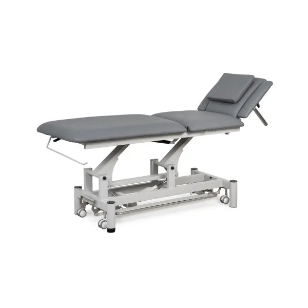 Elektrische Kosmetikliege mit grauer Polsterung, verstellbarem Kopfteil und einmotorigem Gestell für professionelle Massage- und Behandlungsanwendungen.