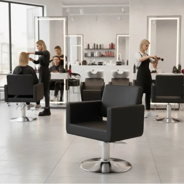 Friseurstuhl in eleganter Schwarz-Farbe, Luxuriöser Friseur stuhl Chic R mit Runder Standfuß - Tiptop - Einrichtung