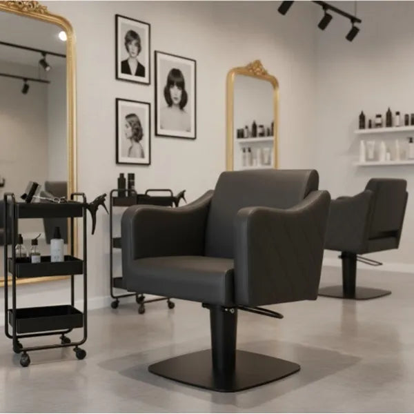 Friseurstuhl in eleganter Schwarz-Farbe, Luxuriöser Friseur stuhl Petal mit hydraulischer Höhenverstellung und edlem Design.