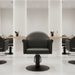Friseurstuhl in eleganter Schwarz-Farbe, Luxuriöser Friseur stuhl Echo mit minimalistischen Linien für moderne Salons.