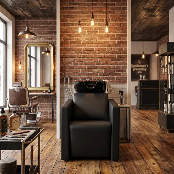 Friseurwaschbecken Peek Black im modernen Friseursalon mit ergonomischem Kippbecken