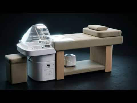 Headspa Liege Wellness: NUKI Kopfspa mit weißem Waschbecken, beige Liege, professionelle Spa-Behandlungen.