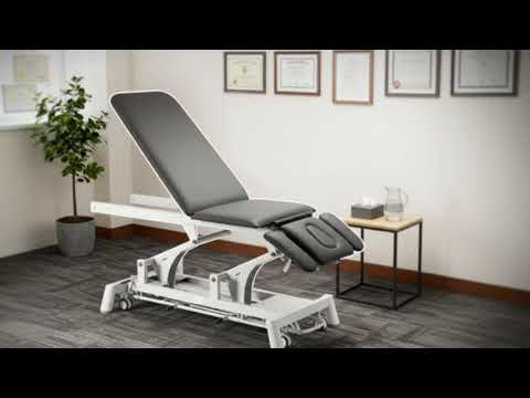 Therapieliege Titan-304F elektrisch mit 1 Motor, Behandlungsliege in Grau, mit verstellbarer Höhe, Kopfstütze und Armlehnen.