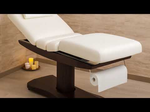 Elektrische Massageliege Mica mit drei Motoren, weiße Polsterung, braunes Fußgestell und Papierrollenhalter