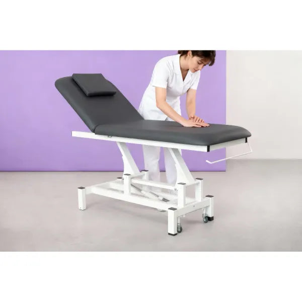 Electric massage table with one motor, height-adjustable treatment bed on white frame for clinics and spas.